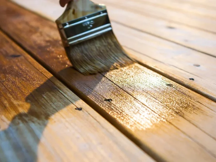 Satin Stain finish being applied to hardwood flooring